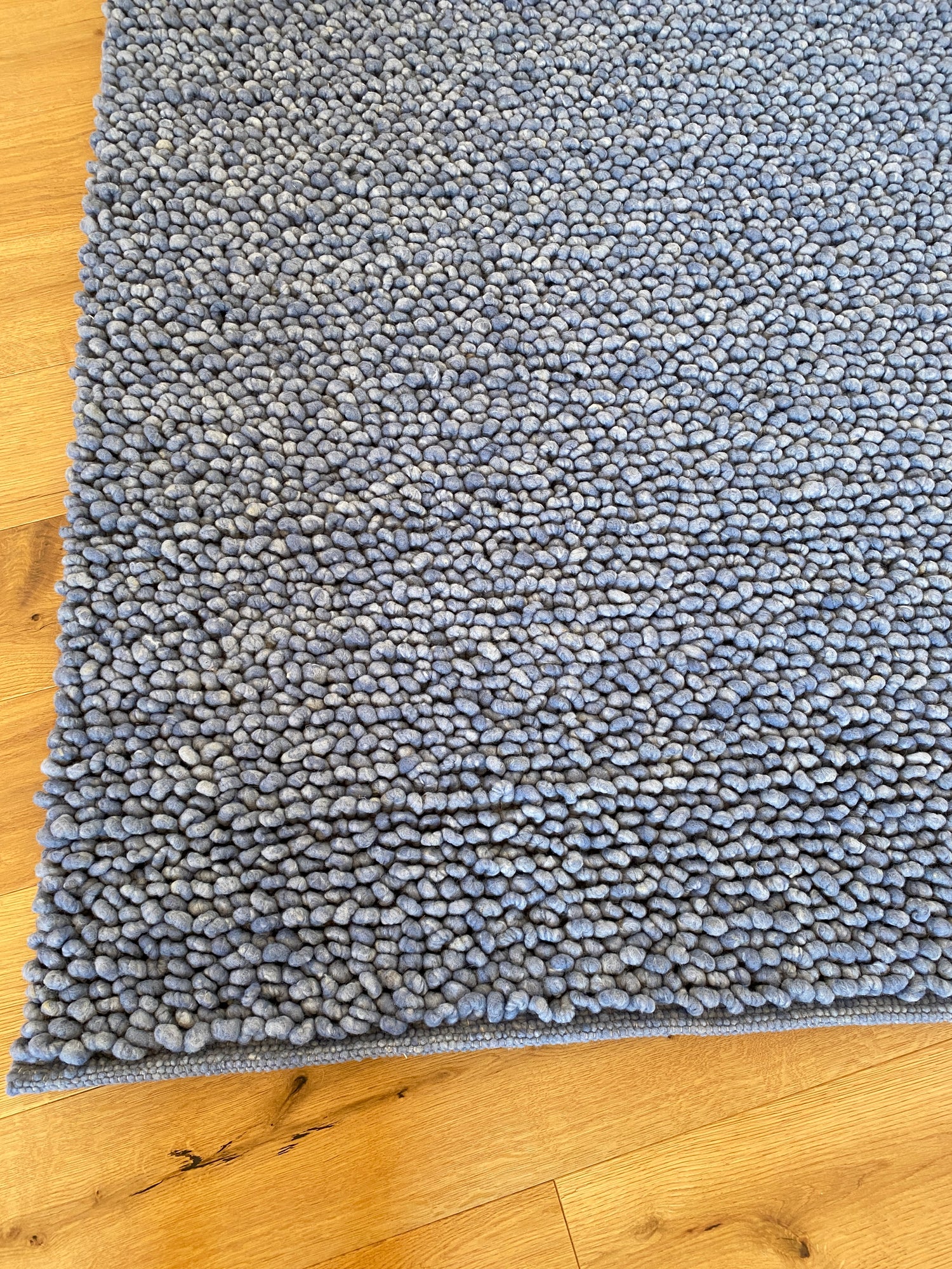 Teppich mit Schlingen, blau meliert